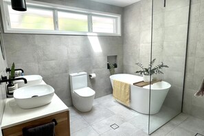 Shower, hair dryer, towels, soap