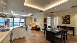 Superior Apartment, 3 Bedrooms, Kitchen, City View | Living area | 42-inch Smart TV with cable channels - Skyline Tower - Service Apartments (Hanoi)