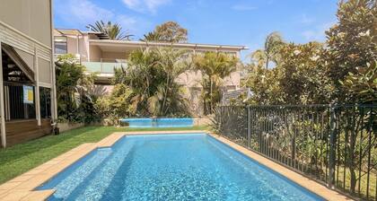 Coastal Upper-Level Home with Pool Access