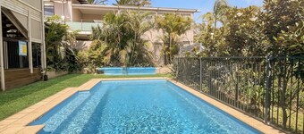 Coastal Upper-Level Home with Pool Access