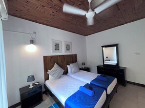 Basic Apartment, 2 Bedrooms, Garden Area | In-room safe, iron/ironing board, free WiFi - castaway lodge (Pointe Au Sel)