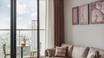 Superior Apartment, 2 Bedrooms, Kitchen, City View | Living area | 42-inch LED TV with cable channels