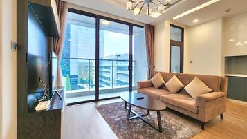 Superior Apartment, 2 Bedrooms, Kitchen, City View | Living area | 42-inch LED TV with cable channels