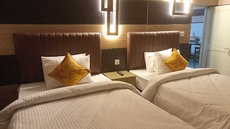 Deluxe Double or Twin Room, City View | 1 bedroom, in-room safe, desk, laptop workspace