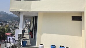 A hotel with a signboard for 'DODHI VINAYAK HOTEL & BANQUET' and 'AC & NON AC ROOMS'. - SIDDHI VINAYAK HOTEL AND BANQUET (Bhimtal)