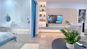 Superior Apartment, 1 Bedroom, Kitchen, City View | Living area | 42-inch LED TV with cable channels
