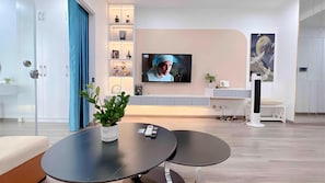 Superior Apartment, 1 Bedroom, Kitchen, City View | Living area | 42-inch LED TV with cable channels - Vinhomes Times City by Emily in Town (Hanoi)