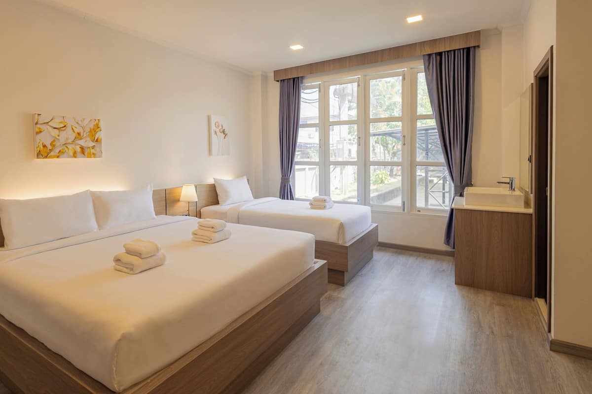 Deluxe Üç Kişilik Oda | Ücretsiz kablosuz İnternet, çarşaf takımı