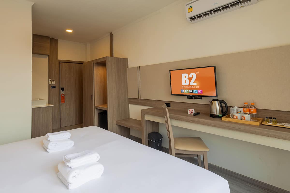 Deluxe Tek Büyük Yataklı Oda | Ücretsiz kablosuz İnternet, çarşaf takımı