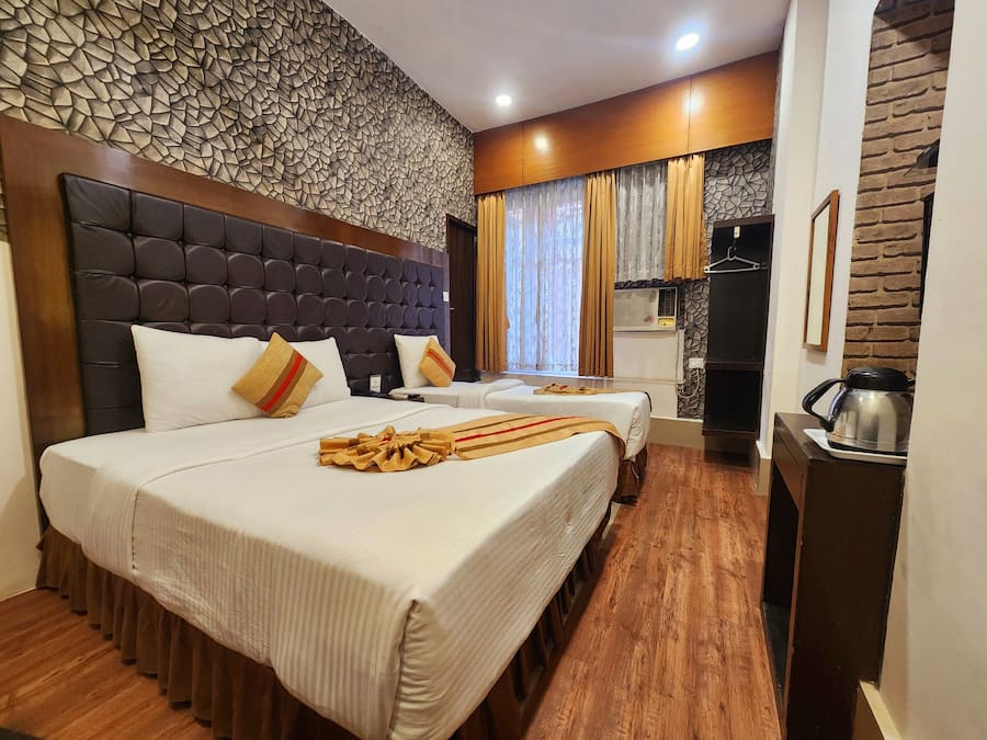 Quarto triplo luxo, vista para a cidade | Wi-Fi de cortesia