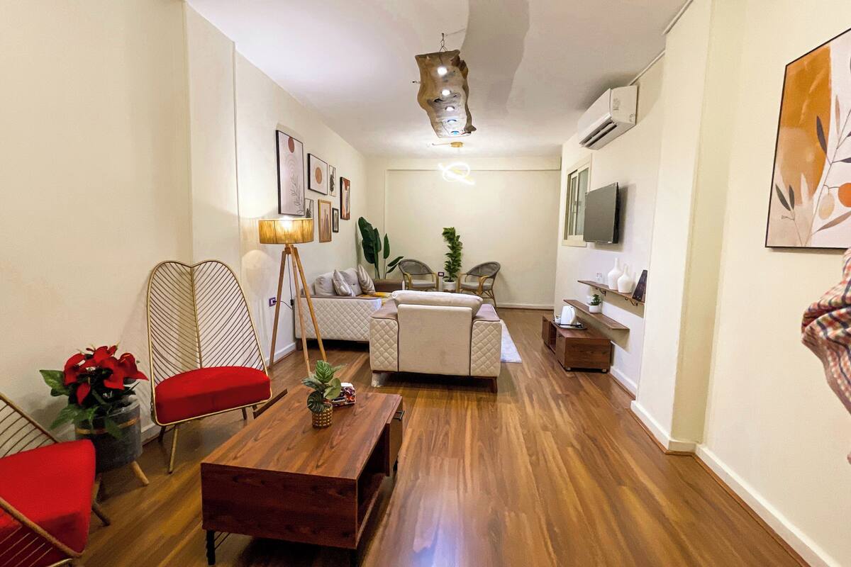 Family Apartment | Living area | 43-inch LCD TV with satellite channels