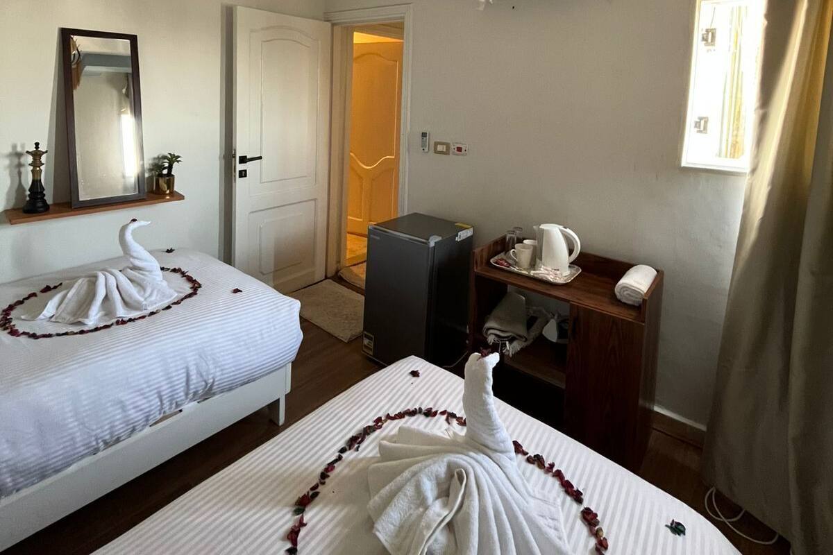 Blackout drapes, soundproofing, WiFi (free), bed sheets