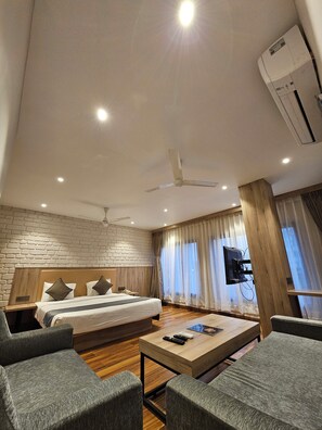 Luxury Double Room, City View | In-room safe, desk, laptop workspace, blackout drapes