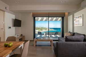 Comfort Apartment, Balcony, Sea View | Living area | 50-inch LED TV with digital channels