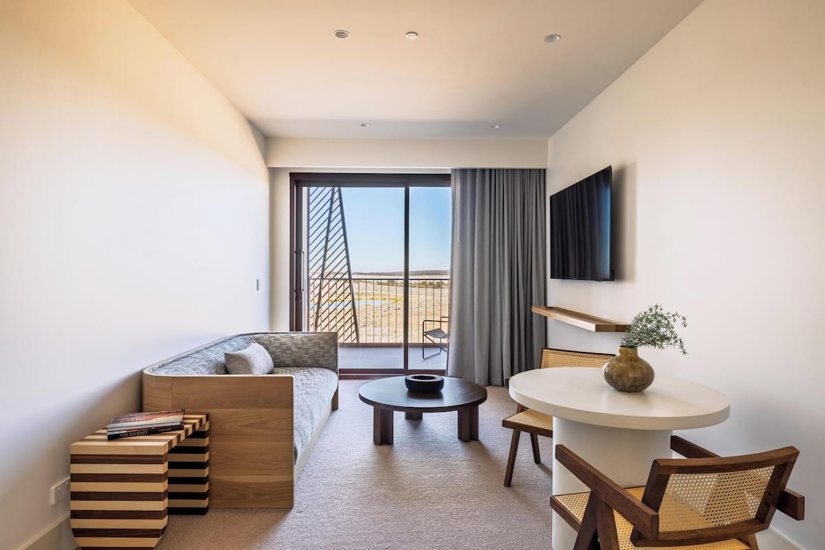 Premium Suite, 1 King Bed, Pool View | 1 bedroom, blackout drapes, iron/ironing board, free WiFi