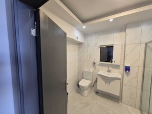 Standard Room | Bathroom | Shower, hair dryer, bathrobes, slippers