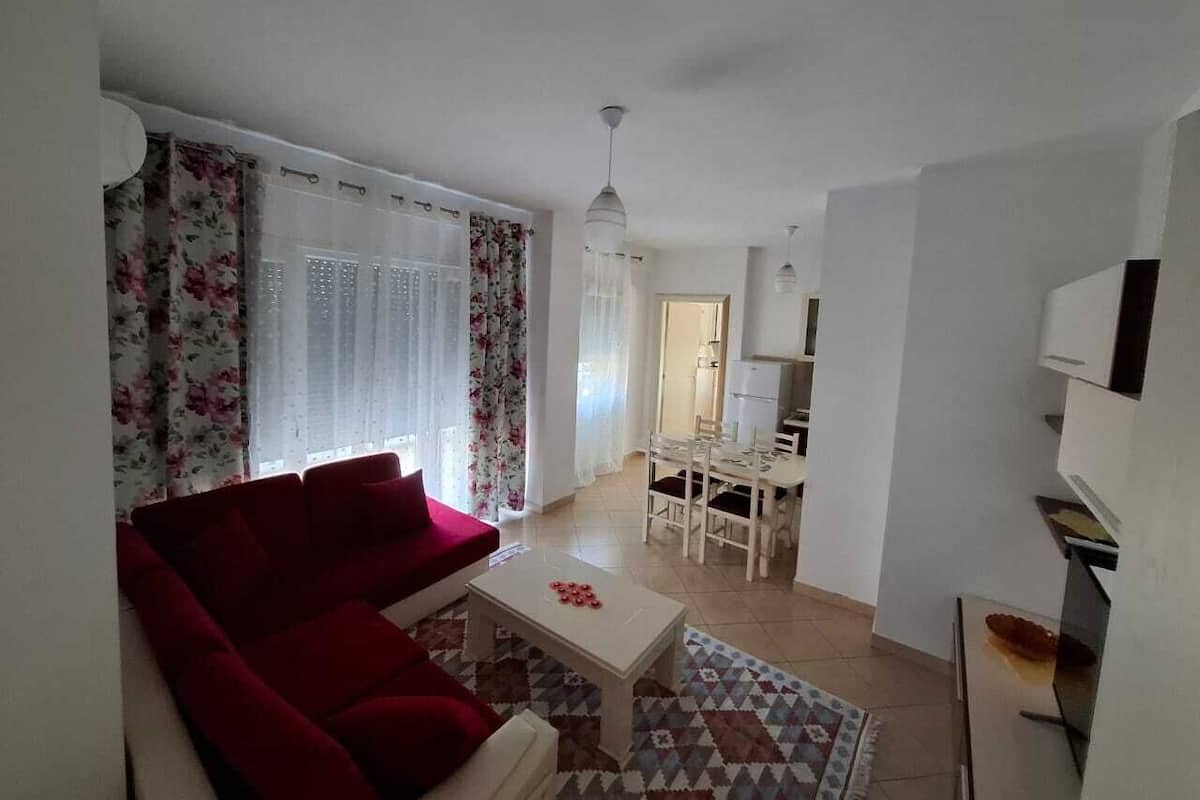 Family Apartment, Balcony, City View | Living area | 32-inch Smart TV with digital channels