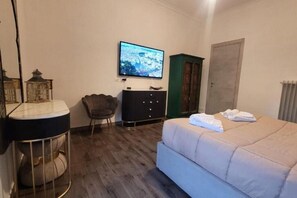 1 habitación, tabla de planchar con plancha, wifi y ropa de cama 