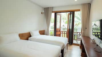 Habitación Deluxe con 2 camas individuales, balcón, vistas al jardín | Vistas desde la habitación