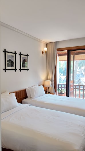 Deluxe Twin Room, Balcony, Garden View | Minibar, desk, free WiFi, bed sheets - Asoca Hotel Luang Prabang (Luang Prabang)