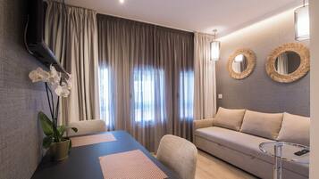 Estudi superior, vistes a la ciutat | Sala d'estar