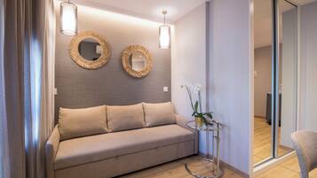 Estudi superior, vistes a la ciutat | Sala d'estar