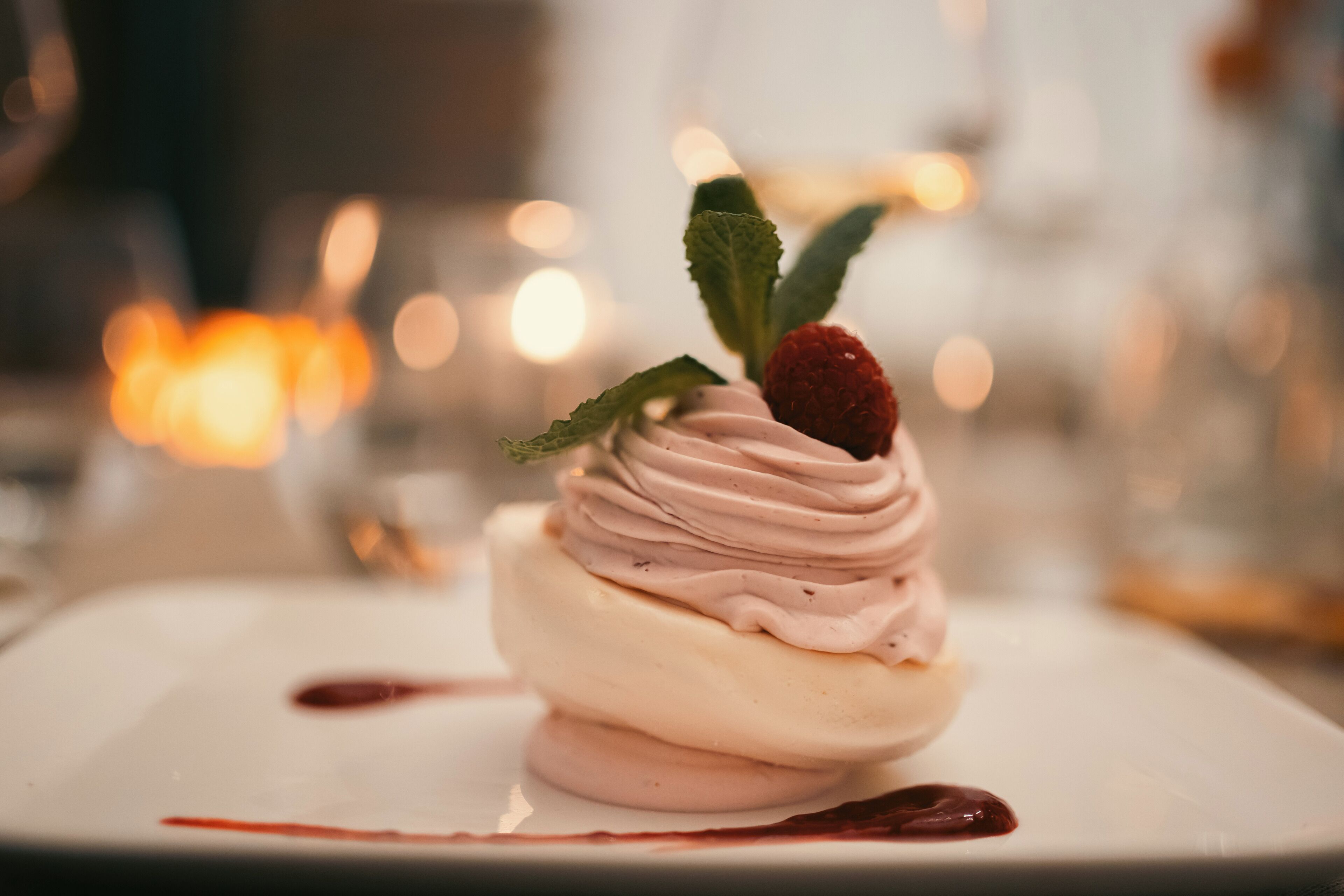 A dessert on a white plate with a blurred background.