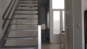 Apartament, 2 dormitoris, vistes a la ciutat | Sala d'estar | Televisor de pantalla plana