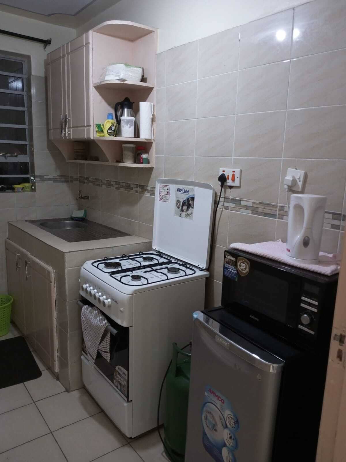 Superior Apartment, City View | Private kitchen | Fridge, microwave, electric kettle, cookware/dishes/utensils