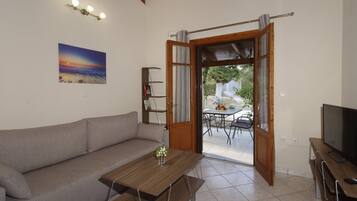 Cottage Standard, 1 camera da letto, vista giardino | Area soggiorno | TV