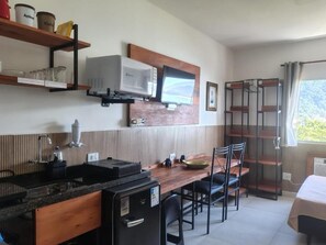 Fridge, microwave, stovetop, cookware/dishes/utensils