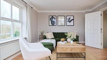 Apartment (3 Bedrooms) | Living area | 32-inch Smart TV with cable channels