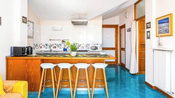 Panoramic Apartment, Partial Sea View | Private kitchenette | Espresso maker, electric kettle