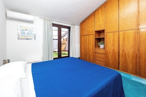 Panoramic Apartment, Partial Sea View | 1 bedroom, down comforters, blackout drapes, free WiFi