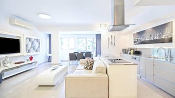 Televisión, reproductor de DVD y oficina