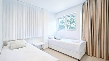 3 habitaciones, tabla de planchar con plancha, cuna de viaje y wifi