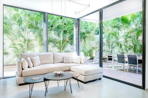Oasis Garden 2BR near the Sea by HolyGuest