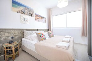 3 habitaciones, tabla de planchar con plancha, wifi y ropa de cama 