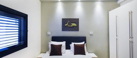 3 habitaciones, tabla de planchar con plancha, wifi y ropa de cama