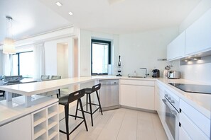 Coffee/tea maker, fridge, microwave, oven