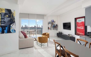 TV, fireplace, DVD player, stereo - Sky 2BR condo w/ Pool and Sea Views by HolyGuest (Tel Aviv)