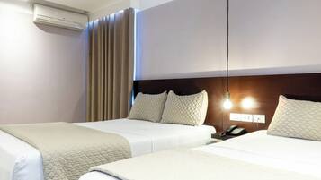 Deluxe Triple Room | Peralatan tempat tidur premium, katil Select Comfort, Wi-fi percuma