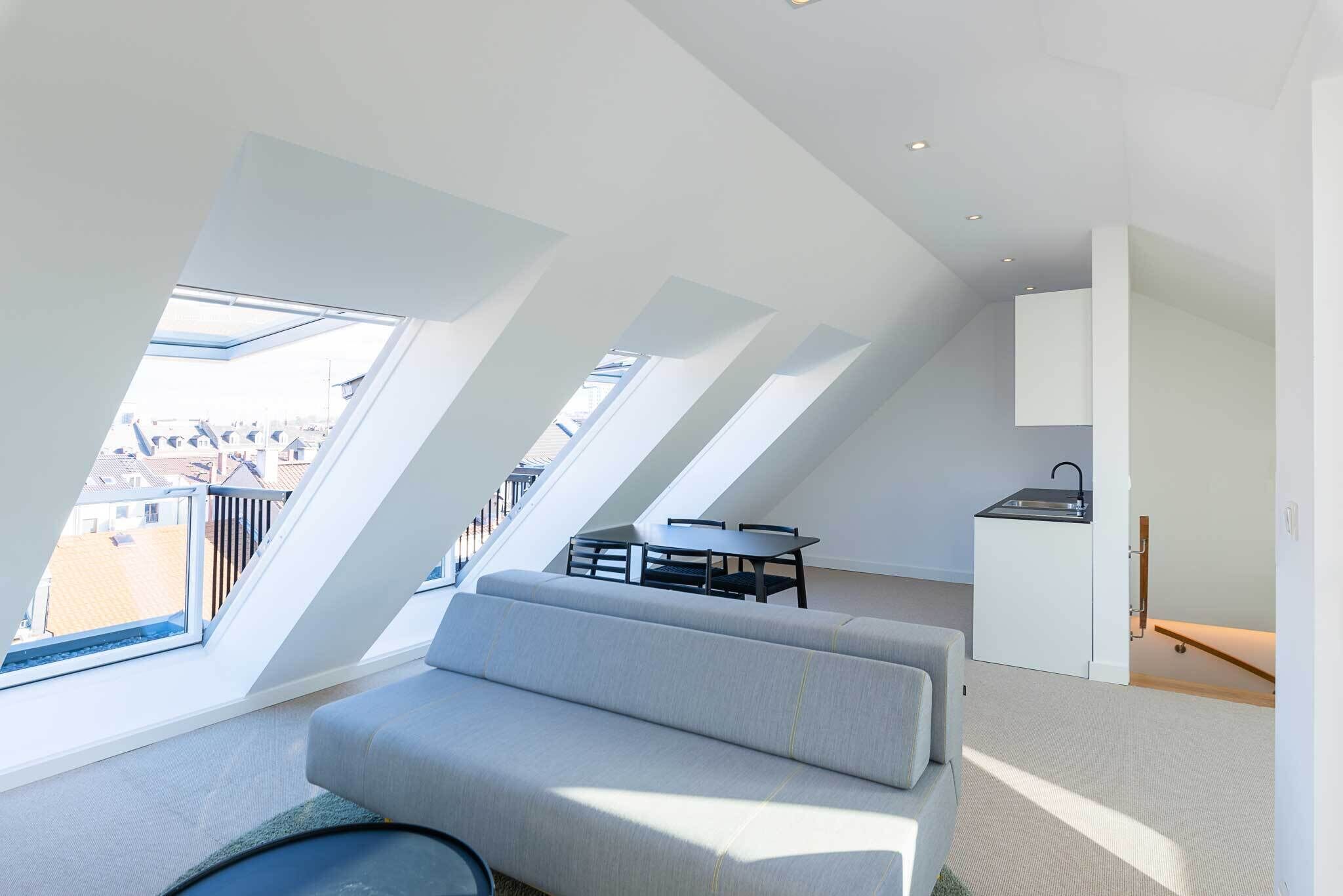Deluxe Duplex | Living area | 40-inch Smart TV with satellite channels