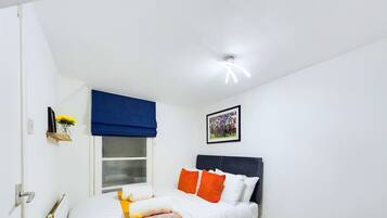 3 bedrooms, desk, iron/ironing board, travel cot