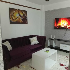 Lägenhet Design | Vardagsrum | 24-tums smart-tv med digitalkanaler