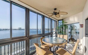 Outdoor dining - Waterfront 2 bed/2 bath, walk or roll to beach, Flagler Ave & local restaurants. (New Smyrna Beach)