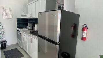 Comfort Apartment, 2 Queen Beds, Kitchen, Poolside | Private kitchen | Coffee/tea maker, toaster, cleaning supplies