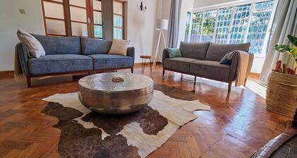 Charming 5-bedroom bed & breakfast with WiFi, fitness room in delightful Harare