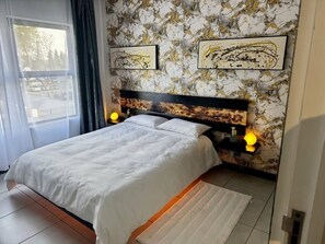 1 chambre, fer et planche à repasser, Wi-Fi, literie fournie