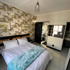 1 habitación, tabla de planchar con plancha, wifi y ropa de cama 